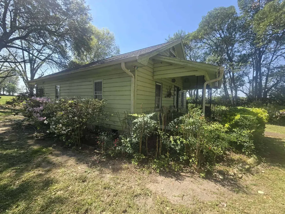 Cleaned up and trimmed shrubs and lawn around a West Columbia area home